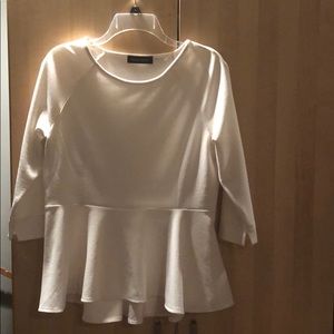 Beautiful white peplum shirt with 3/4 sleeves